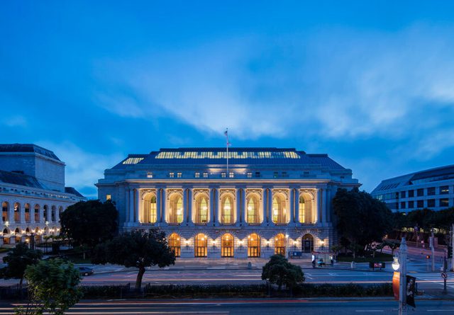 Evening street view of the War Memorial Opera House in San Francisco, CA.