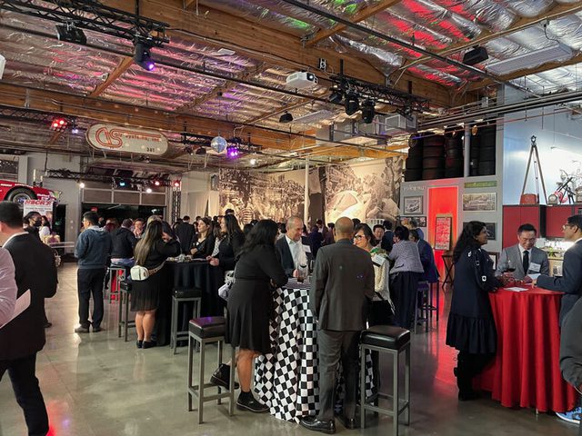 Gathering of people inside the Club Auto Sport, San Jose, CA.
