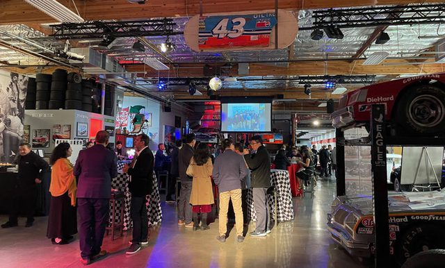 Gathering of people inside the Club Auto Sport, San Jose, CA.