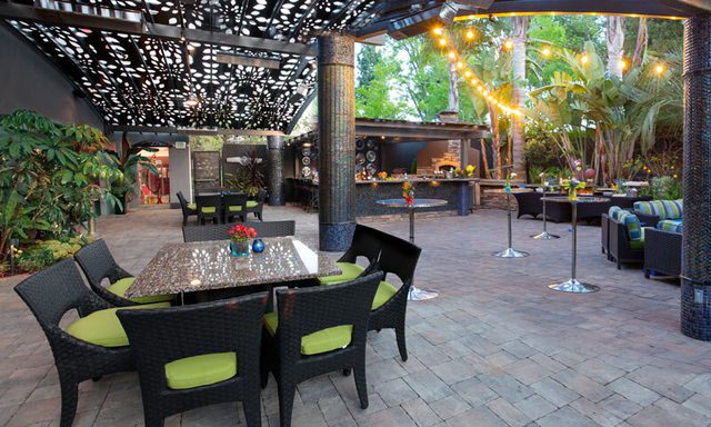 Patio seating with twinkle lights outside the Club Auto Sport, San Jose, CA.
