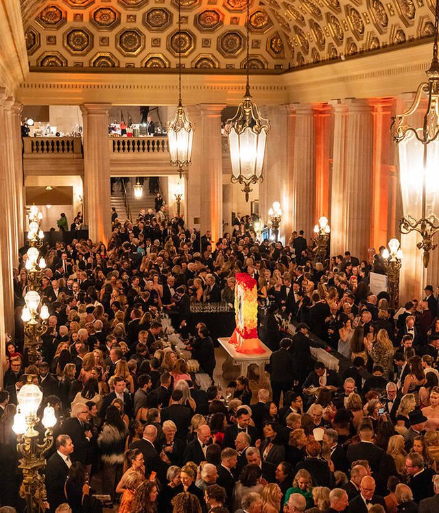 View of an event in the lobby full of people at the San Francisco Ballet.